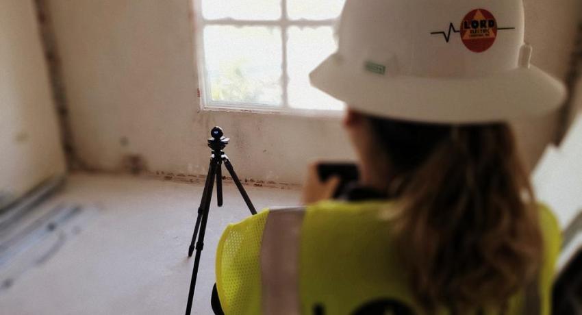 Construction worker surveying