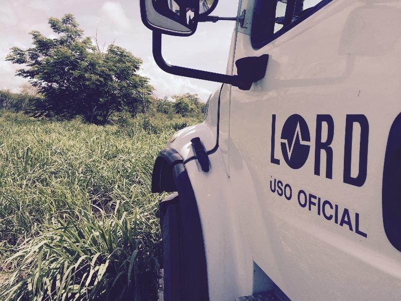 Lord construction truck with logo on door